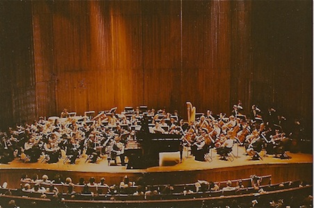 Banat conducting his Westchester Conservatory Orchestra with alumnus,  Garrick Ohlson celebrating the Conservatory’s 50th Anniversary, at Tully Hall, 1979